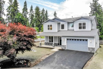 Completed two-storey home with mature landscaping