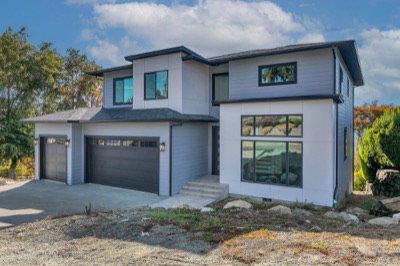 Completed contemporary home on a rural parcel