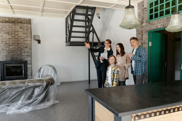 an agent showing the property to the new homeowners