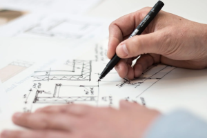 person designing a house