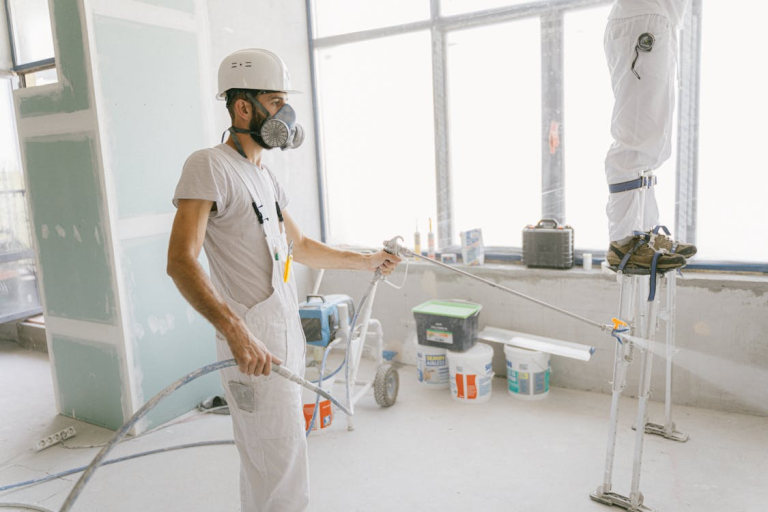 Man in White T-shirt Wearing Hard Hat